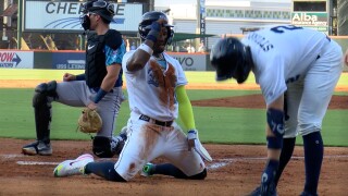 Hooks' Luis Aviles Jr. slides home