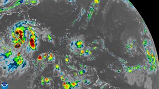 GOES image of tropical storm Helene (at left)