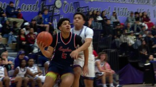 Veterans Memorial Eagles freshman Jaron Couture drives baseline