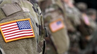 U.S. Air Force members, in their uniforms, as they line up