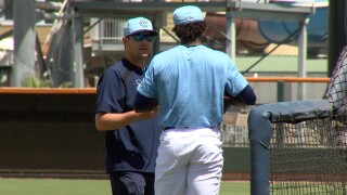 Hooks pitcher with coach.jpg