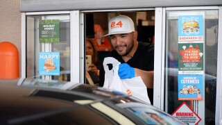 'Tis the season to give; Jose Trevino serves at Whataburger before tournament begins