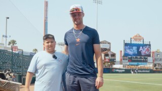 Kid Reporter Kaden Stump with Hooks catcher Collin Price